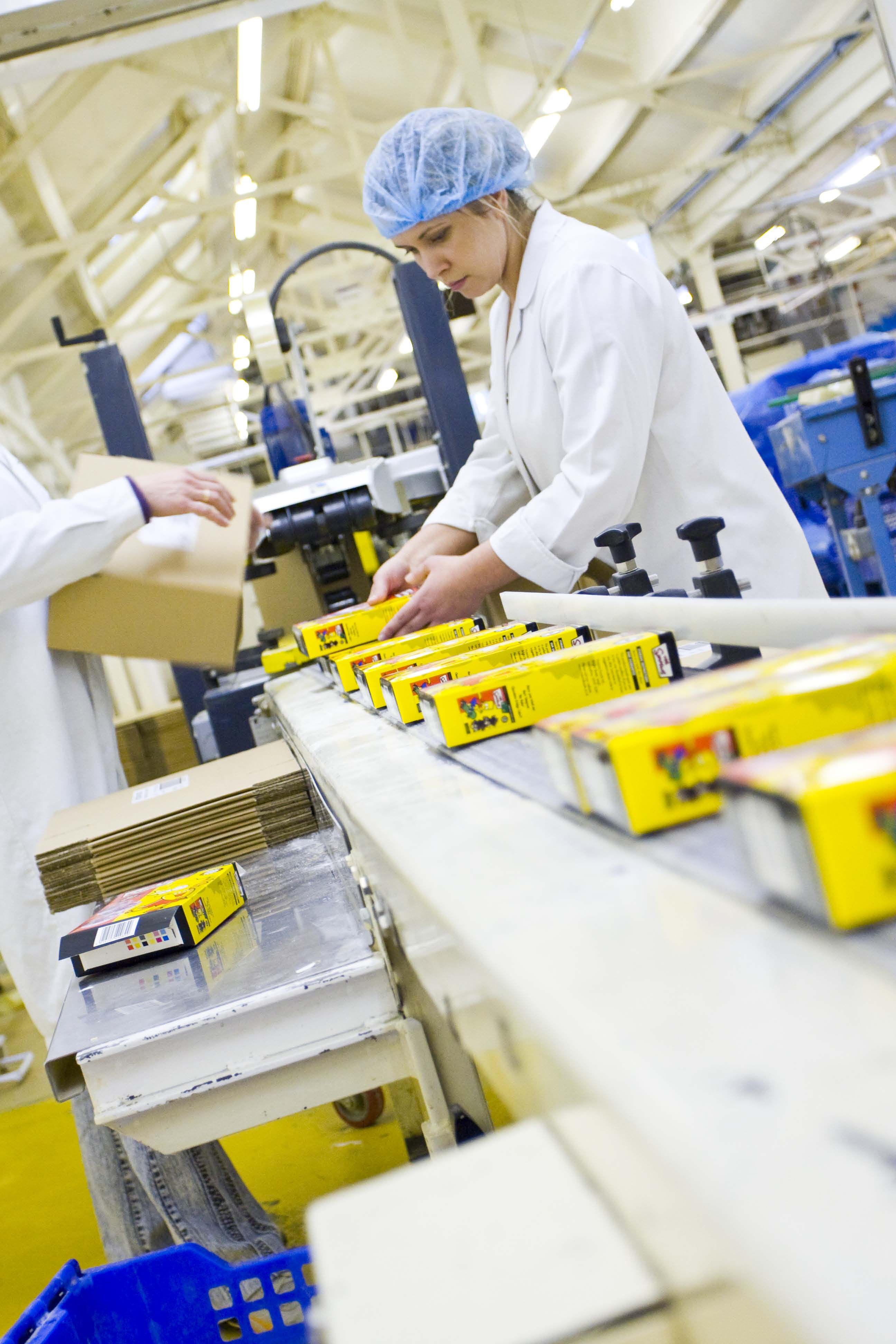Multi-component carton products running down our production line.